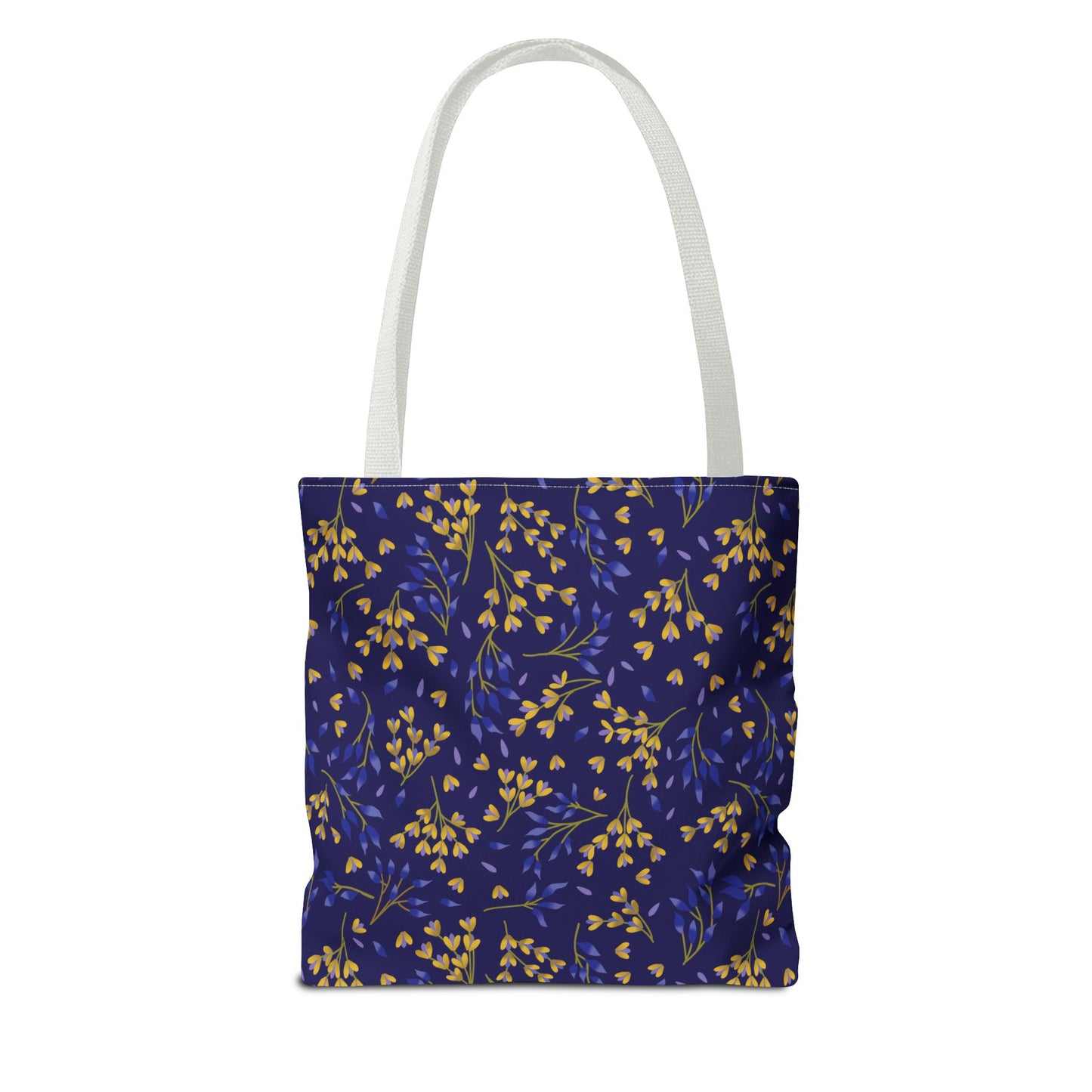 Floral Tote Bag featuring a deep navy blue body adorned with a cheerful botanical pattern of gold-yellow and blue leafy sprigs, complemented by sturdy white webbing handles for stylish summer outings.