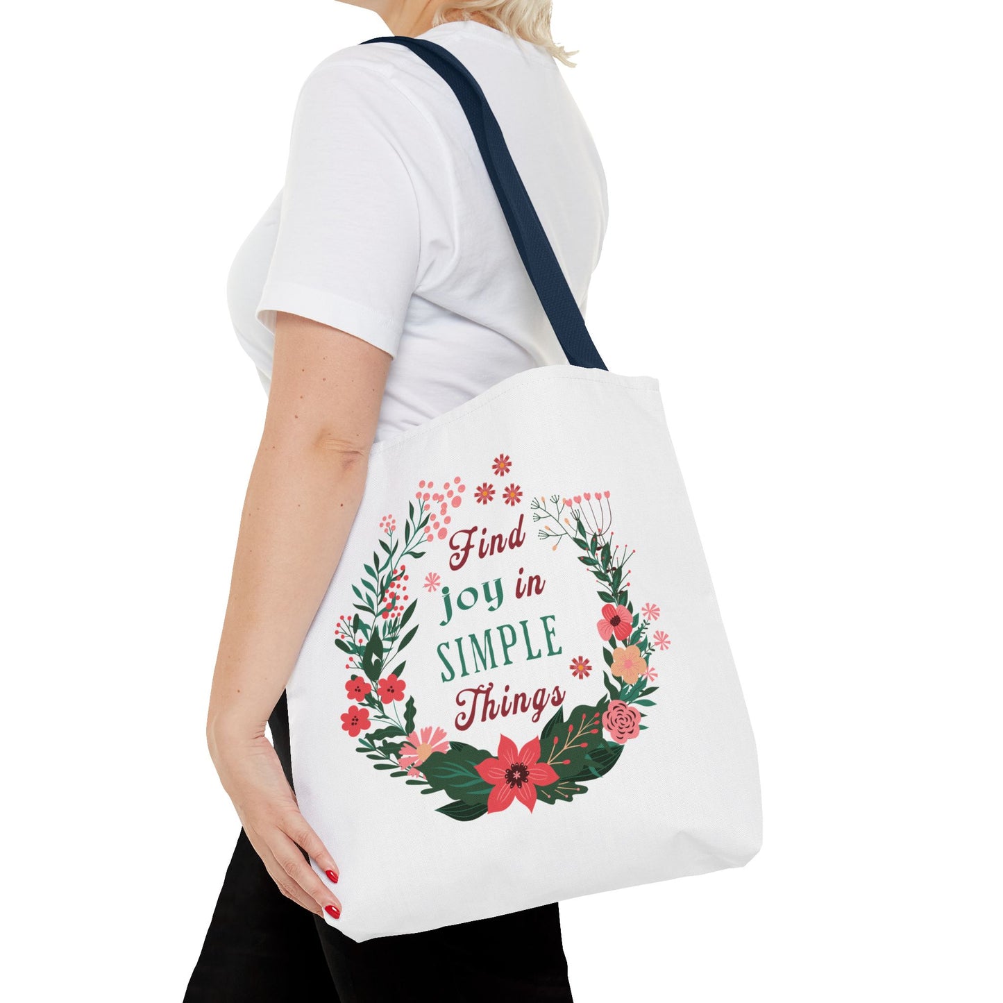 Find Joy in Simple Things Tote Bag, featuring a watercolor floral design, carried by a woman. Ideal for stylish, everyday use.