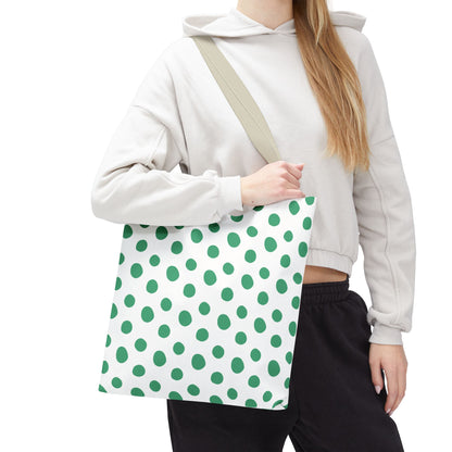 Green Polka Dots Tote Bag held by a woman, showcasing its vibrant pattern and spacious design, ideal for adding a cheerful touch to casual outings.