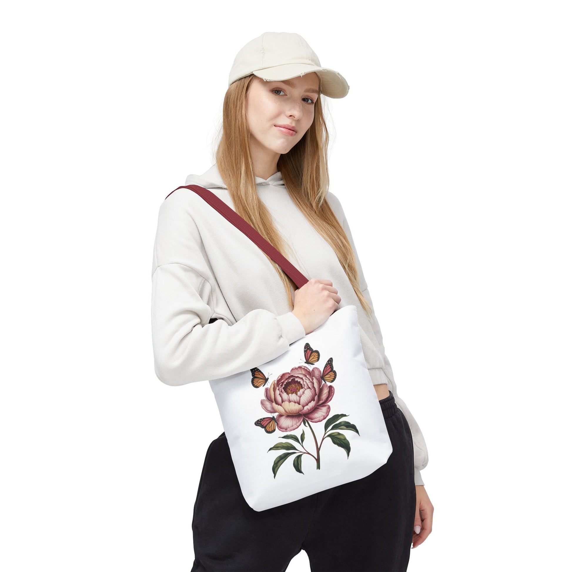 Botanical with Vintage-Inspired Illustration Tote Bag displaying vivid flowers, intricate leaves, butterflies, and moths; ideal for nature lovers. This tote combines elegance with functionality, enhancing everyday flair.