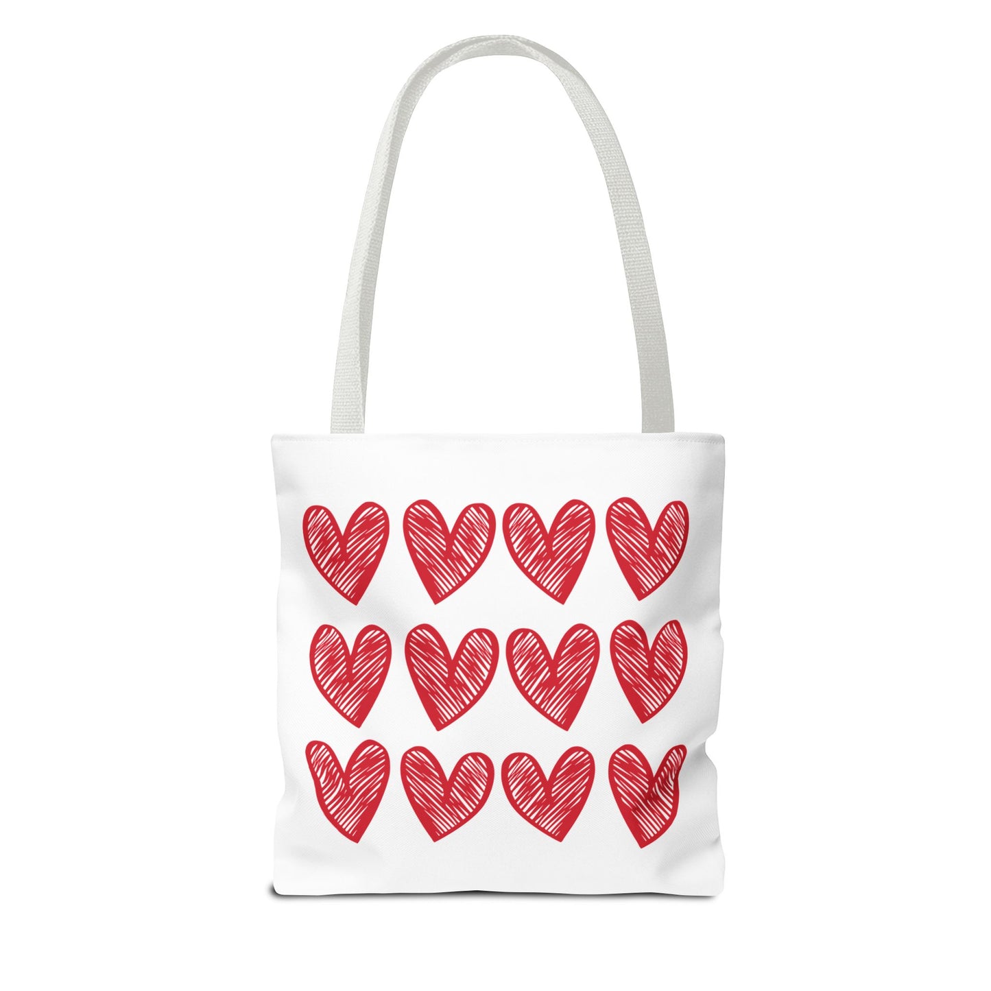 Hearts Tote Bag adorned with red hearts, showcasing quirky charm and durability. Perfect for everyday use and special occasions, aligning with FireBrook Designs’ uplifting, stylish ethos.