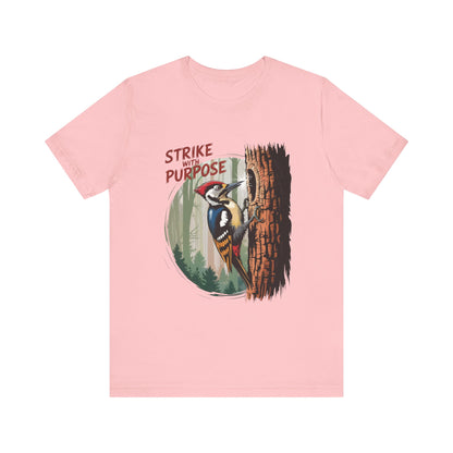 Woodpecker: Strike with a Purpose Bella+Canvas Unisex T-Shirt featuring a cartoon woodpecker climbing a tree, symbolizing motivation. Ideal for casual wear and nature enthusiasts.