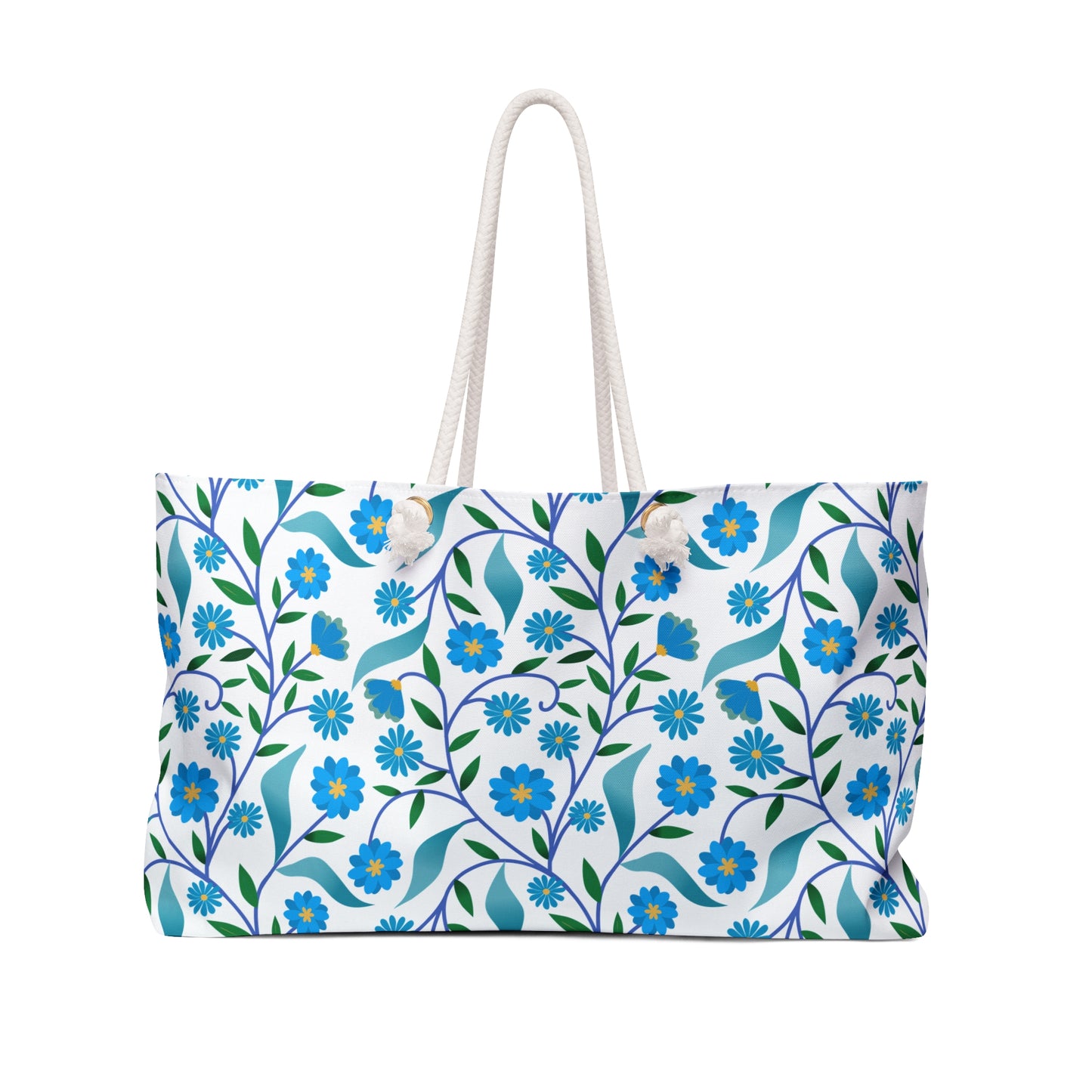 Weekender Bag featuring blue floral and green leaf pattern on a white canvas, with thick rope handles. Ideal for stylish, joyful travel experiences, reflecting FireBrook Essentials' commitment to uplifting designs.