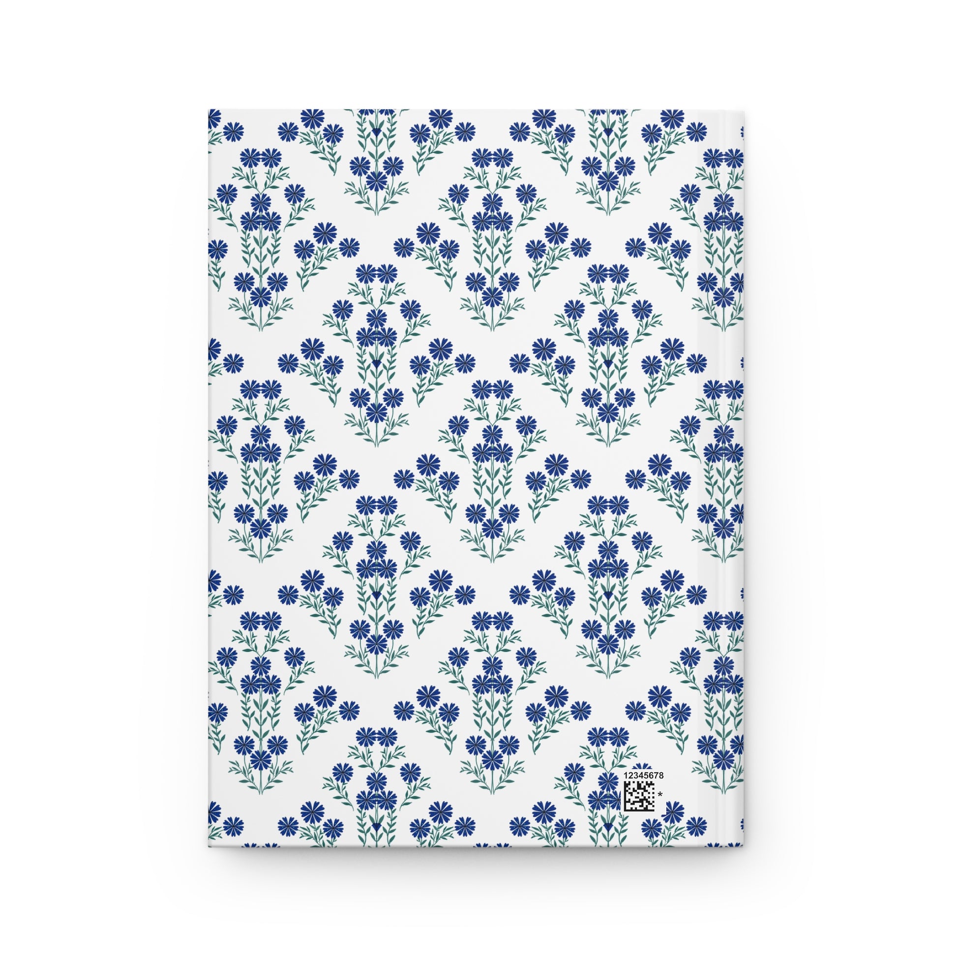HARDCOVER JOURNAL, MATTE, RULED, 5X7, SEWN BIND, CLEAN-TEAR PAGES – INDIGO DAISY: Back cover features a pattern of small blue flowers and a discreet production barcode in the corner.