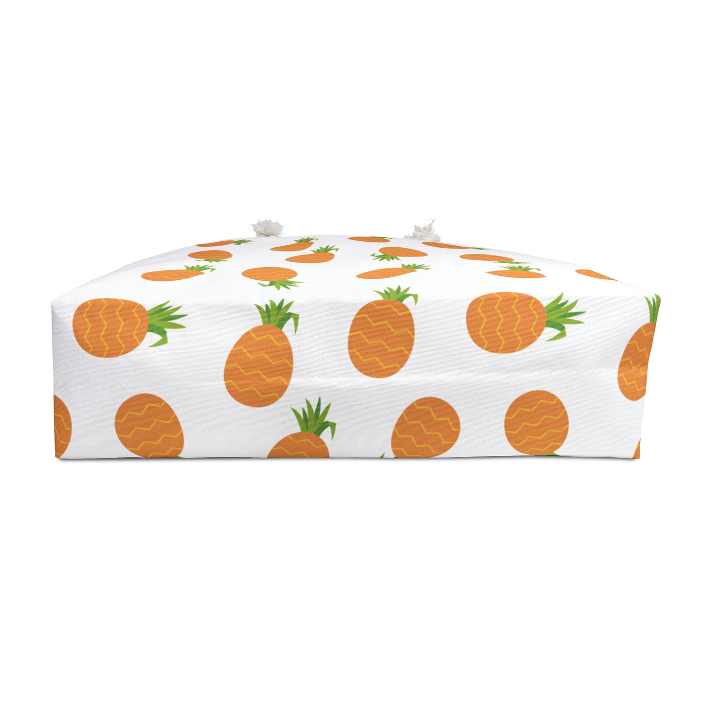 Weekender Bag - Pineapple Pattern: A white box adorned with vibrant orange pineapples, showcasing FireBrook Designs' stylish and durable bag, perfect for joyful summer getaways and tropical adventures.