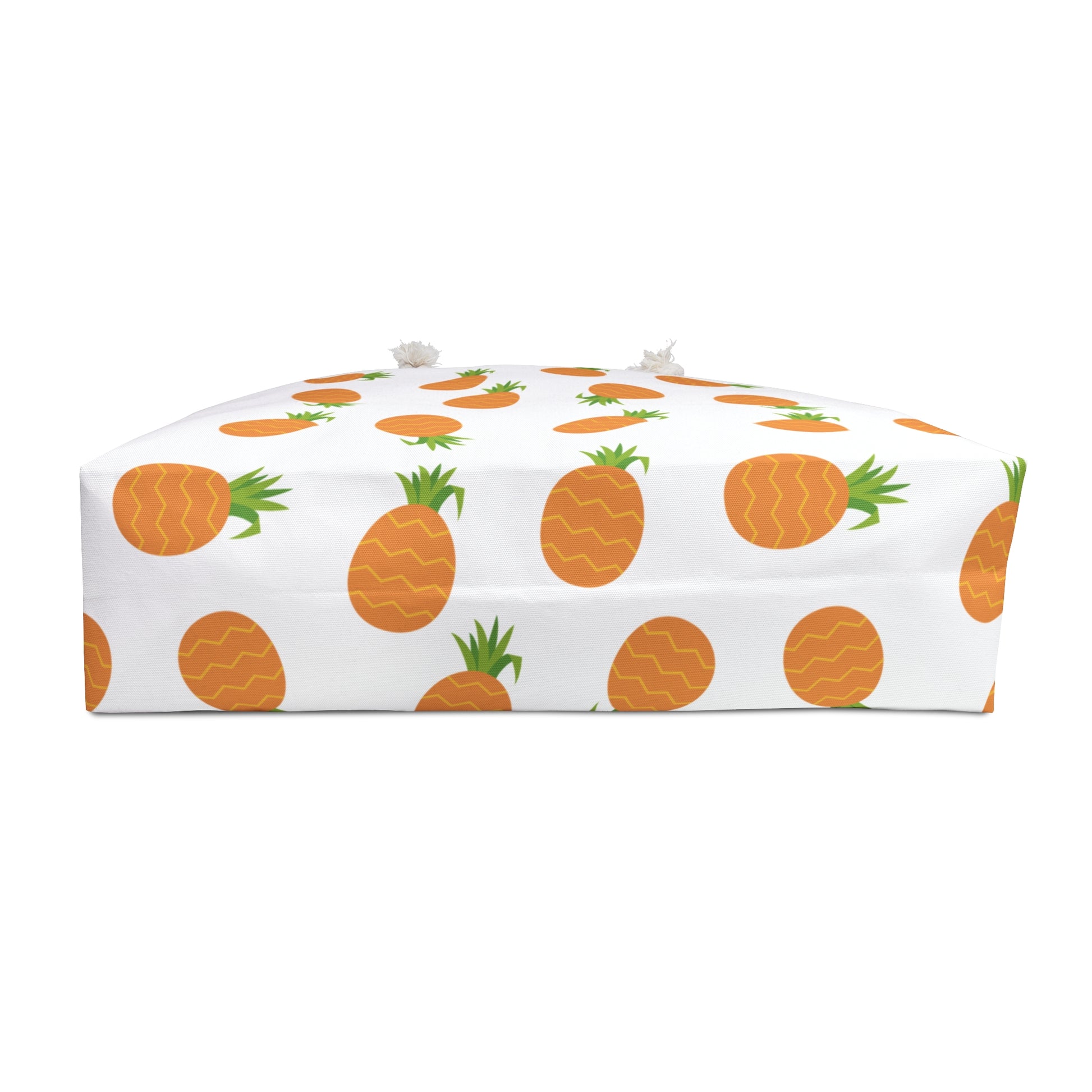 Weekender Bag - Pineapple Pattern: A white box adorned with vibrant orange pineapples, showcasing FireBrook Designs' stylish and durable bag, perfect for joyful summer getaways and tropical adventures.