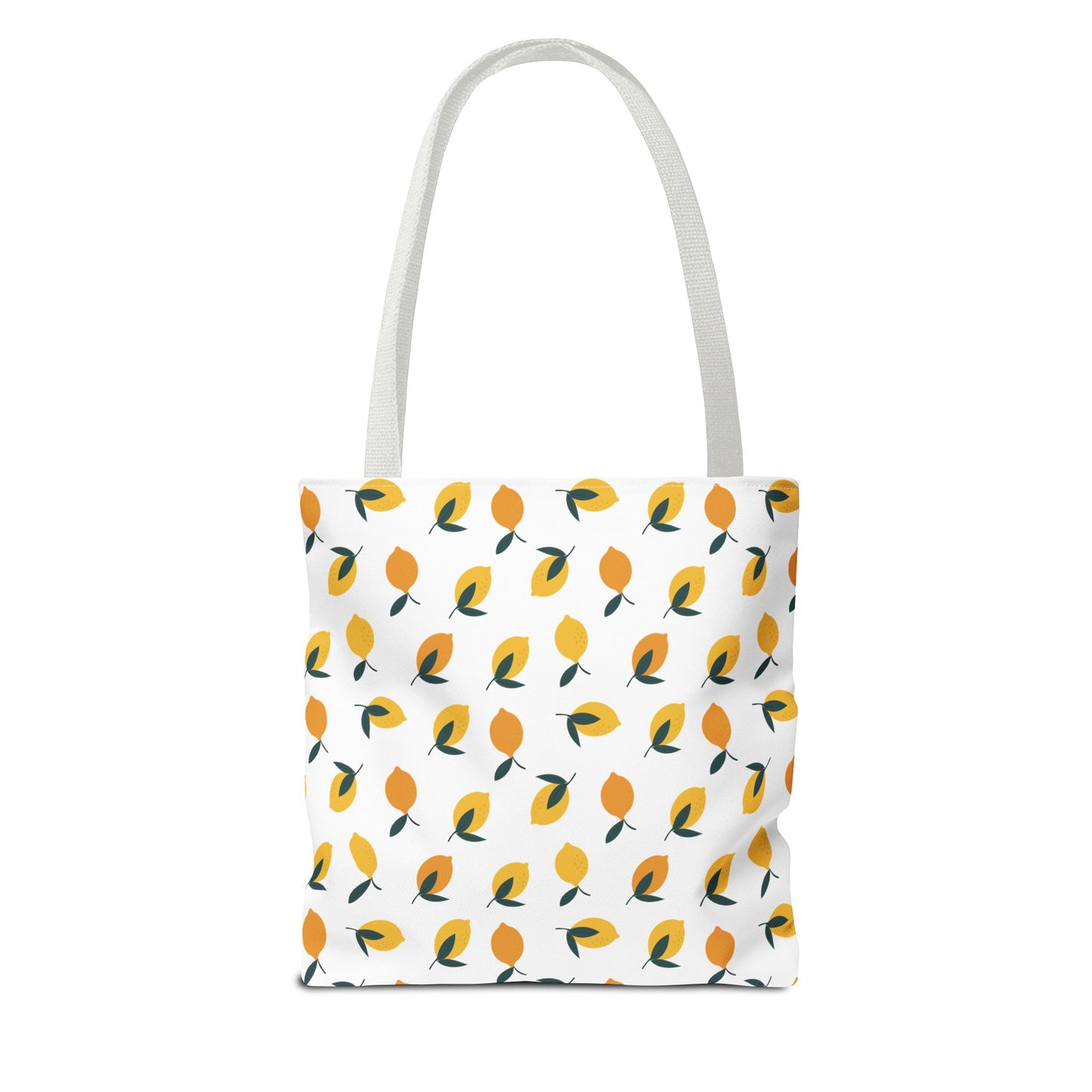 Lemon Drop Toss Tote Bag featuring a vibrant, scattered lemon motif with dark green leaves, designed for durability and style—perfect for brightening summer outings or trips with its cheerful pattern.