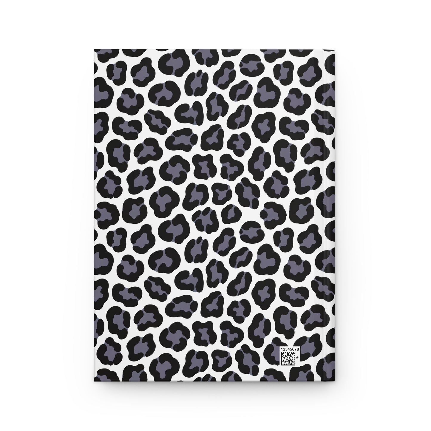 HARDCOVER JOURNAL, MATTE, RULED, 5X7, SEWN BIND, CLEAN-TEAR PAGES – LEOPARD, NEUTRAL COLOR features a white cover with stylized black leopard spots, includes a tiny QR-style code for product identification.