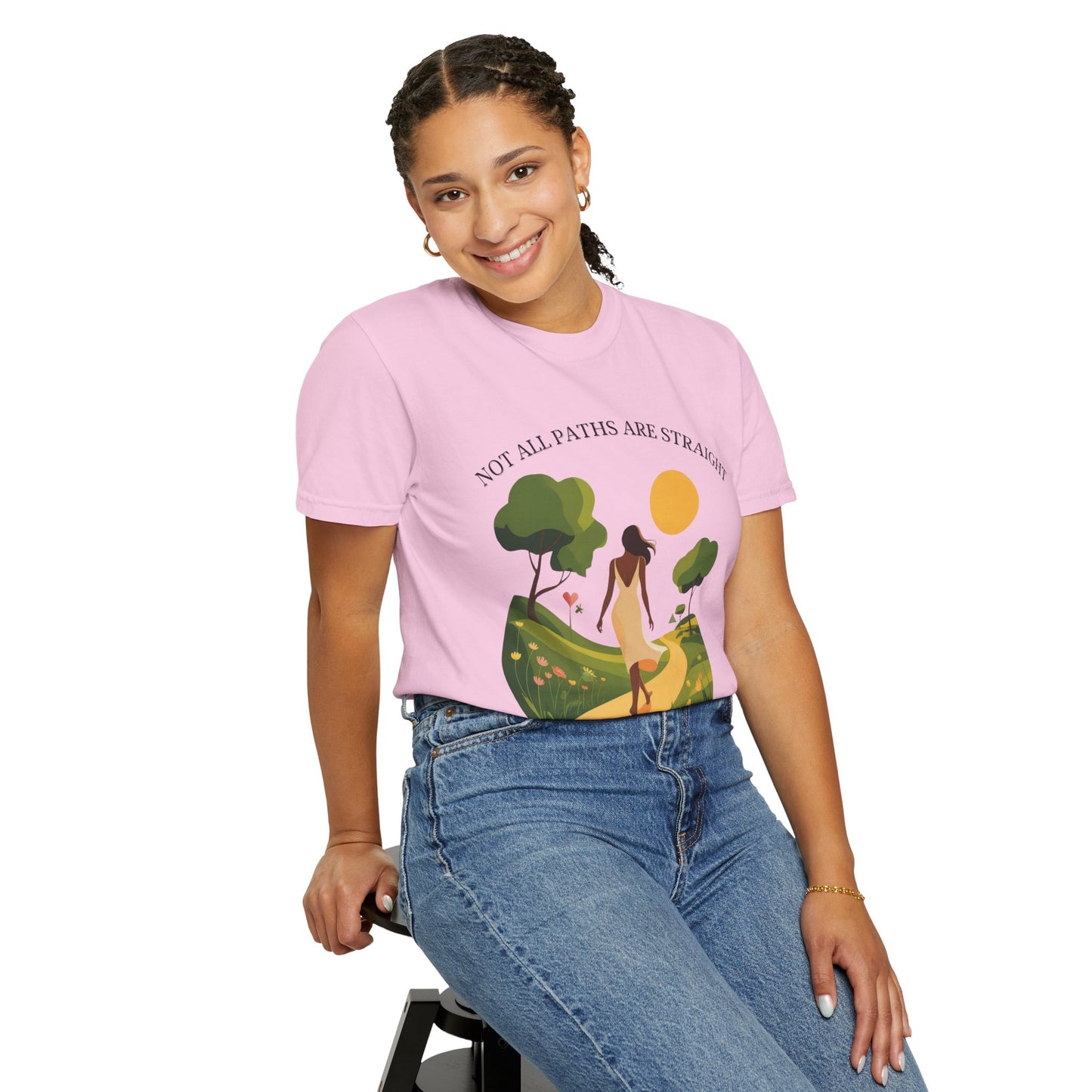 Inspirational Message T-Shirt on a smiling woman, seated on a stool, showcasing the relaxed fit and soft texture, embodying comfort and positivity from FireBrook Essentials.