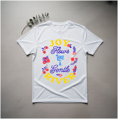 Joy Flows Like a Gentle River T-Shirt features a relaxed fit with text and branch design, offering comfort and style. Perfect for casual wear, reflecting FireBrook Designs' uplifting apparel ethos.