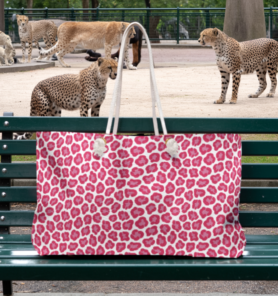 Cheetah Weekender Bag: Featuring a bold cheetah print, this spacious bag embodies adventure and spontaneity, perfect for stylish travelers. Includes durable rope handles and a T-bottom for extra storage.
