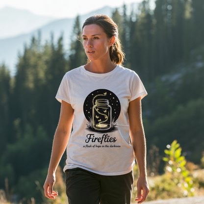 Fireflies A Flash of Hope in the Darkness T-Shirt depicts a nature-inspired design symbolizing hope, perfect for casual wear. Its soft, durable fabric aligns with FireBrook Essentials' commitment to comfort and positivity.