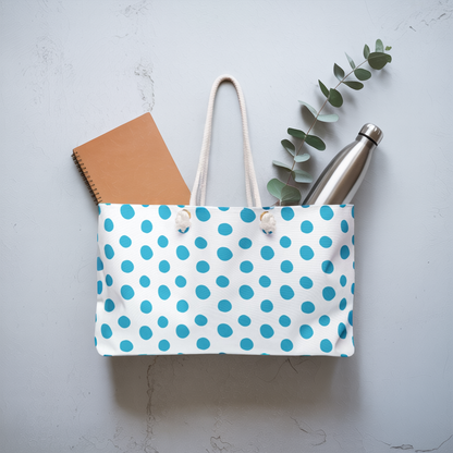 Weekender Bag - Light Blue Polka Dots Travel Tote features a playful design with rope handles and a spacious T-bottom, ideal for weekend getaways and embodying FireBrook Essentials' joyful, stylish ethos.