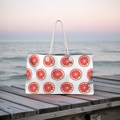 Weekender Bag Orange Slices Print with vibrant citrus design and rope handles, ideal for cheerful summer outings, showcasing FireBrook Designs' commitment to stylish, uplifting travel essentials.